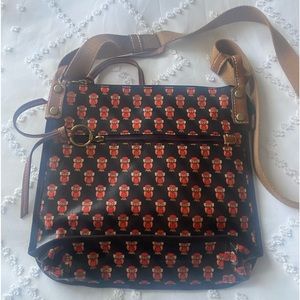 Fossil crossbody owl handbag.  Like new black with owl pattern